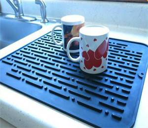 Durable silicone dish drying pad with stay clean scrubby,  anti-bacterial, dish washer safe and heat resistant trivet 